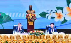 Thủ tướng Lê Minh Hưng và Thủ tướng Saleumxay Kommasith đồng chủ trì Hội nghị Xúc tiến đầu tư Việt Nam-Lào. (Ảnh: THANH GIANG) 