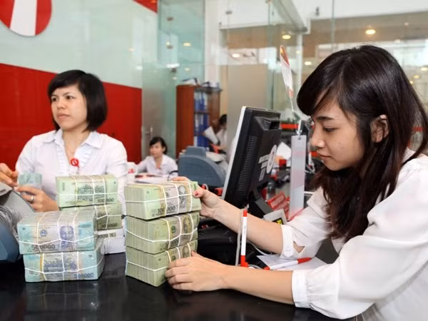 Nếu điều kiện thuận lợi, lãi suất cho vay có thể giảm thêm từ 1-2%. (Ảnh: Trần Việt/ TTXVN).
