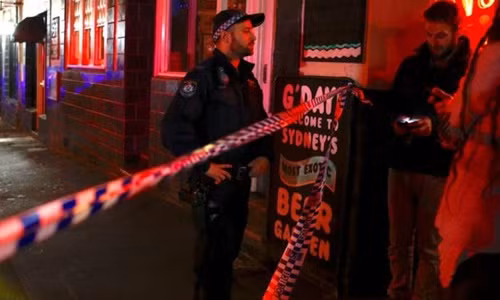 Cảnh sát phong tỏa một con đường sau các cuộc đột kích ở Sydney ngày 29/7. Ảnh: Reuters.