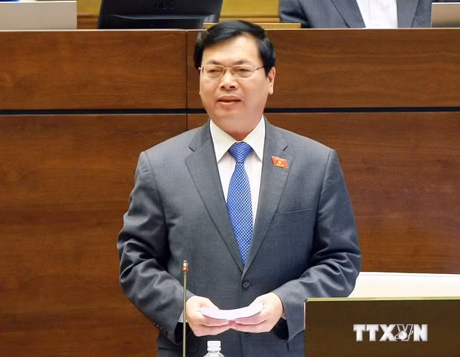 Bộ trưởng Bộ Công thương Vũ Huy Hoàng trả lời chất vấn của đại biểu Quốc hội. (Ảnh: Nhan Sáng/TTXVN)