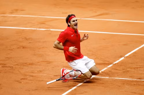 Roger Federer ăn mừng chiến thắng. Ảnh: Reuters