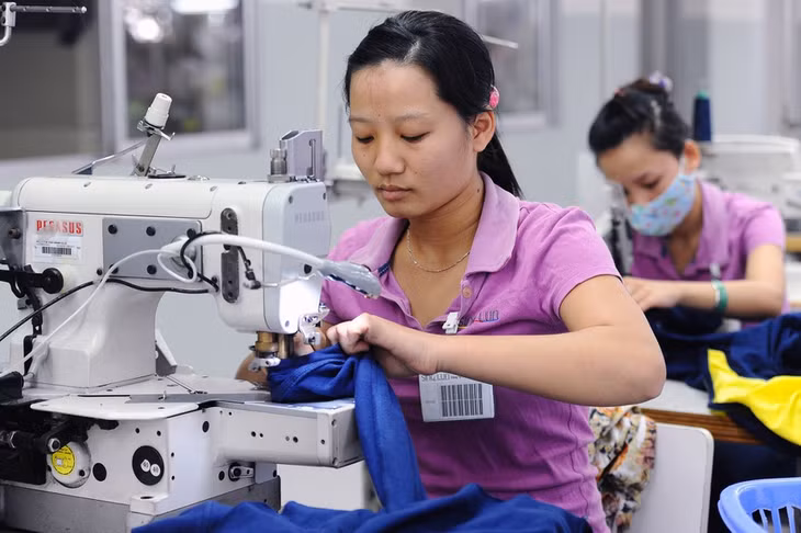 Dệt may duy trì được kim ngạch xuất khẩu ấn tượng. Ảnh: Hoàng Hà.