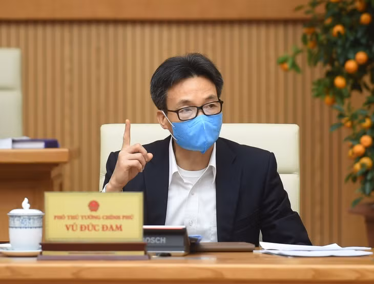 Phó Thủ tướng Chính phủ Vũ Đức Đam, Trưởng Ban Chỉ đạo quốc gia phòng chống dịch COVID-19 phát biểu tại cuộc họp. - Ảnh: VGP/Quang Hiếu