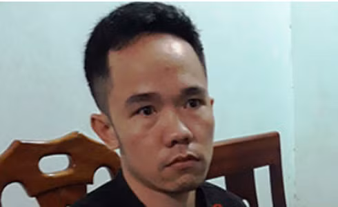  Lô Văn Tuấn bị bắt giữ tại cơ quan công an.