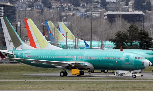 Máy bay 737 MAX thử nghiệm bên ngoài nhà máy của Boeing hồi tháng 2. Ảnh: Reuters.