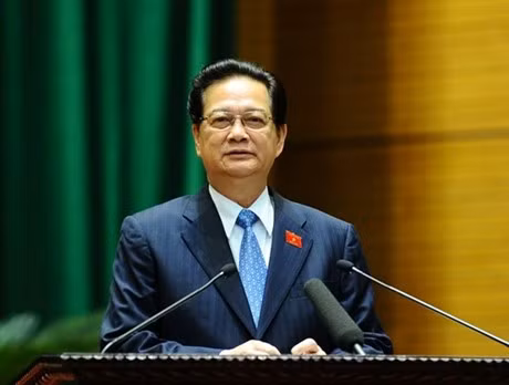 Thủ tướng Nguyễn Tấn Dũng trình bày Báo cáo giải trình và trả lời chất vấn trước Quốc hội, chiều 21/11. Ảnh: VGP/Nhật Bắc