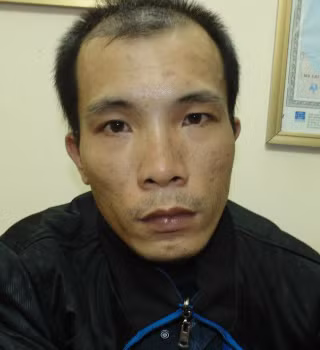 Dũng tại cơ quan điều tra. Ảnh: P.V