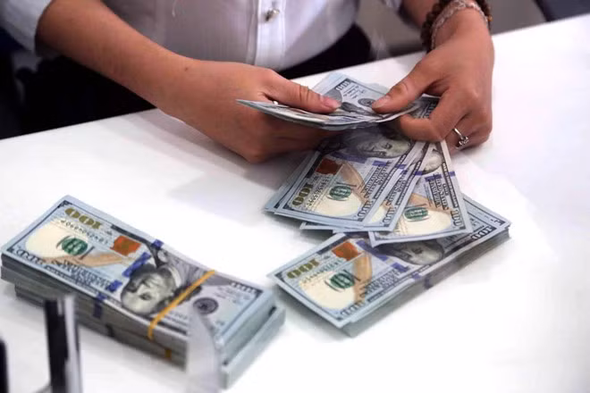 Đồng USD tăng trở lại sáng 21.12