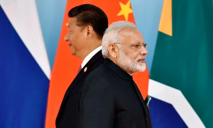 Thủ tướng Ấn Độ Narendra Modi (phải) và Chủ tịch Trung Quốc Tập Cận Bình tại một hội nghị ở Trung Quốc năm 2017. Ảnh: AFP.