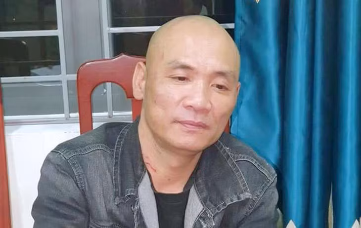 Nghi can Trung tại cơ quan điều tra. Ảnh: Hùng Le