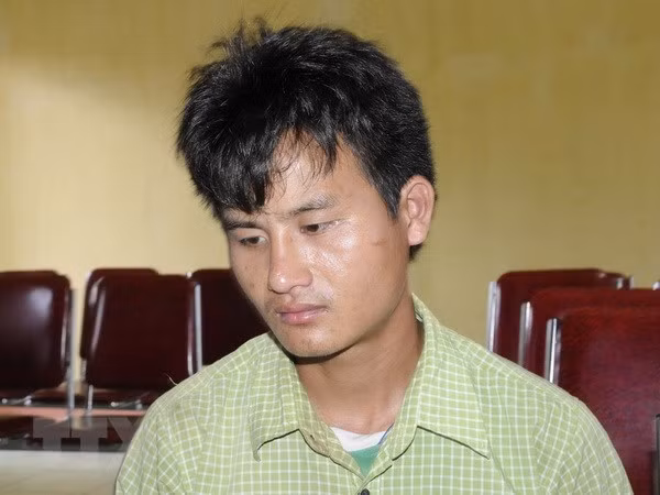 Đối tượng Phoong Xồng tại cơ quan chức năng. (Ảnh: TTXVN phát)
