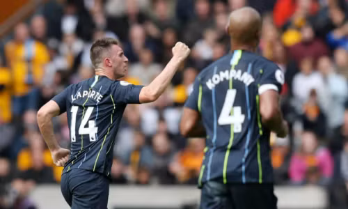 Laporte mang về một điểm cho Man City sau khi để cho Wolves dẫn trước. Ảnh: Rex.