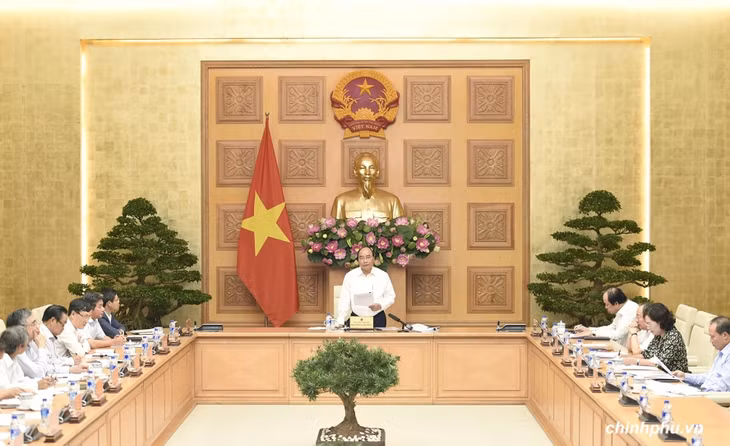 Thủ tướng làm việc với Tổ tư vấn kinh tế. Ảnh: VGP/Quang Hiếu