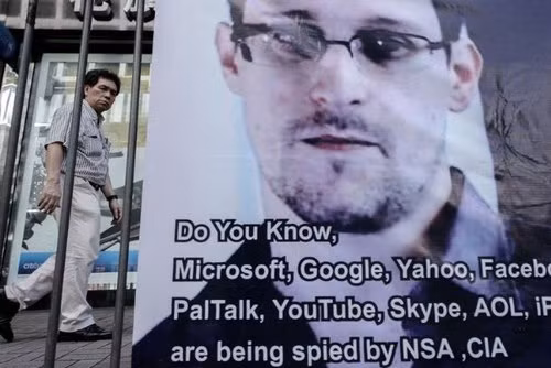  Một băng rôn ủng hộ cựu nhân viên NSA Snowden tại Hong Kong, hồi tháng 6. Ảnh: AFP