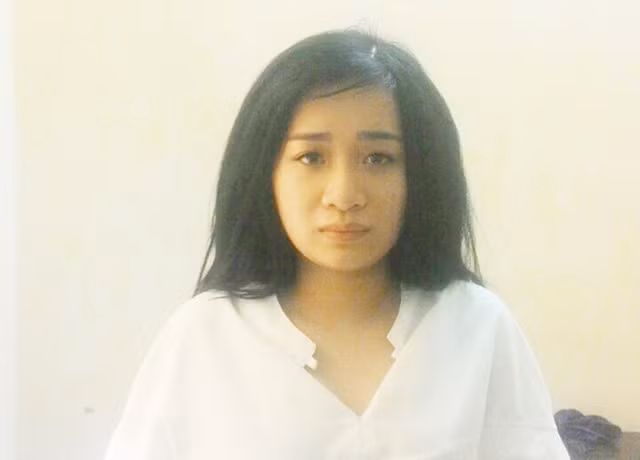 Hoàng Thị Nhứng tại cơ quan công an. Ảnh: dantri.com.vn