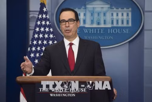 Bộ trưởng Tài chính Mỹ Steven Mnuchin phát biểu trong cuộc họp báo tại Washington DC. Ảnh: AFP/TTXVN