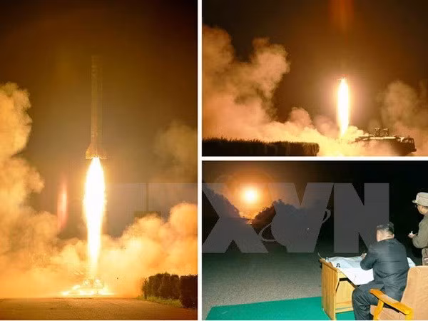 Nhà lãnh đạo Triều Tiên Kim Jong-un theo dõi vụ thử tên lửa đạn đạo tầm ngắn tháng 7/2014. (Ảnh: Yonhap/ TTXVN)