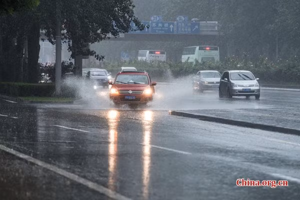 Mưa lớn trong sáng 20/7 ở Bắc Kinh. (Nguồn: THX)
