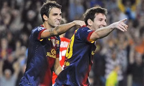 Fabregas muốn chơi cạnh Messi tại Barca, như thời hai người còn cùng nhau phụng sự Barca. Ảnh: AFP.