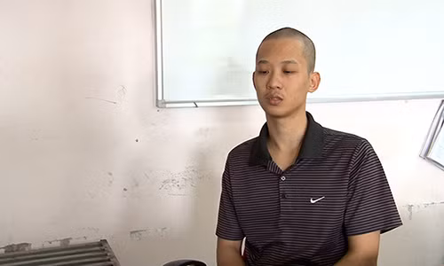 Trần Quang Tùng tại cơ quan điều tra. Ảnh: Thanh Tùng