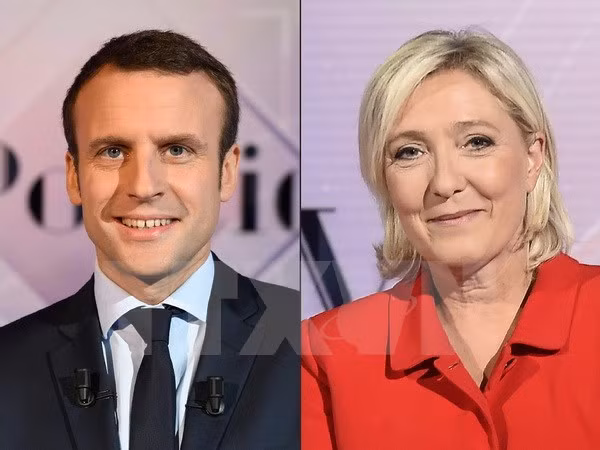 Ứng cử viên Tổng thống Pháp Emmanuel Macron (trái) và Marine Le Pen. (Nguồn: AFP/TTXVN)