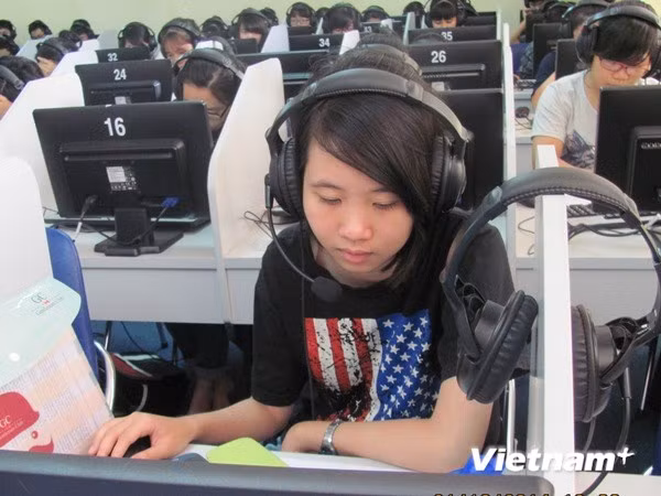 Giờ học ngoại ngữ của sinh viên Đại học Hà Nội. (Ảnh: Phạm Mai/Vietnam+)