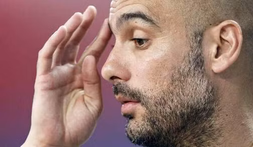 Guardiola buồn rầu- Ảnh Getty