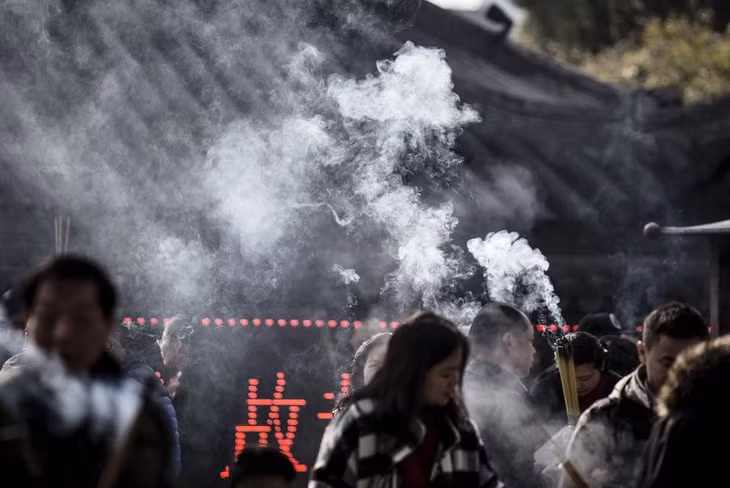 Tôn giáo, tâm linh đang được khai thác trở thành ngành kinh doanh lớn ở Trung Quốc. Ảnh: Bloomberg.
