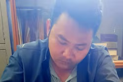 Hoài tại cơ quan công an. Ảnh: Khánh Hương.