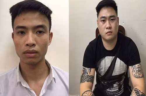 Hai bị can Đỗ Thành Tôn (bên trái) và Phạm Đức Anh. Ảnh: L. Nhi.