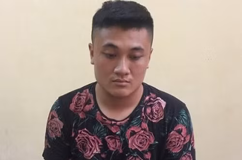 Nghi phạm Nguyễn Thành Trung tại trụ sở công an. Ảnh: L. Nhi.
