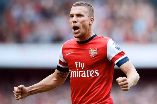Podolski sẽ vắng mặt trong trận Derby London cuối tuần này