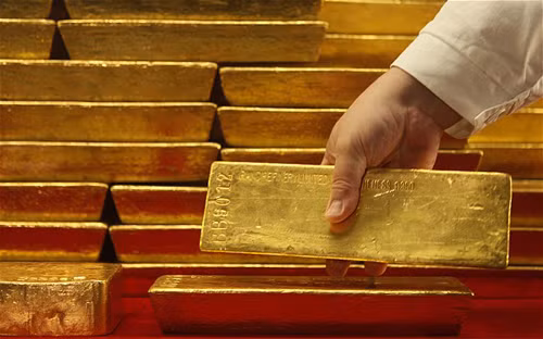 Giá vàng hôm qua lên sát 1.245 USD mỗi ounce, mức cao nhất kể từ tháng 11/2016. Ảnh: Telegraph.