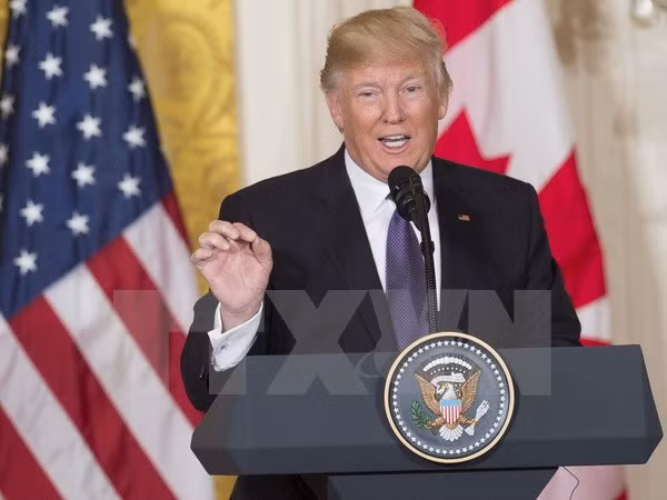 Tổng thống Mỹ Donald Trump phát biểu tại cuộc họp báo ở Washington, DC ngày 13/2. (Nguồn: AFP/TTXVN)