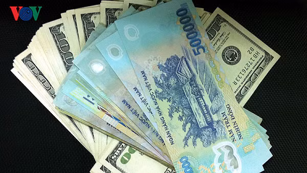 Giá USD giảm từ 4 - 8 đồng tại nhiều ngân hàng thương mại. (Ảnh minh họa)