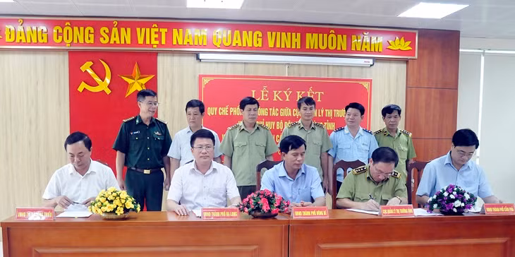 Cục QLTT và UBND các địa phương ký quy chế phối hợp.