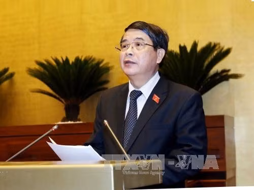 Chủ nhiệm Uỷ ban Tài chính, Ngân sách của Quốc hội Nguyễn Đức Hải trình bày Báo cáo thẩm tra dự án Luật Quản lý nợ công (sửa đổi). Ảnh: Nguyễn Dân - TTXVN