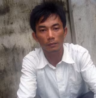 Đối tượng Nguyễn Văn Nhuần tại cơ quan điều tra.
