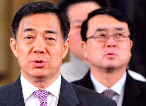 Cựu Bí thư Bạc Hy Lai (trái) và ông Vương Lập Quân thời tại chức - Ảnh: Reuters