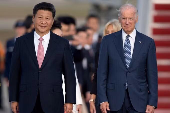 Chủ tịch Trung Quốc Tập Cận Bình (trái) và Joe Biden khi là phó tổng thống Mỹ năm 2015. Ảnh: AP.