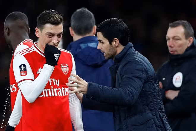 Khoảng thời gian cuối sự nghiệp của Ozil ở Arsenal là nốt trầm buồn. Ảnh: Getty Images.