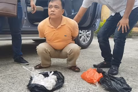 Đối tượng Minh và tang vật.