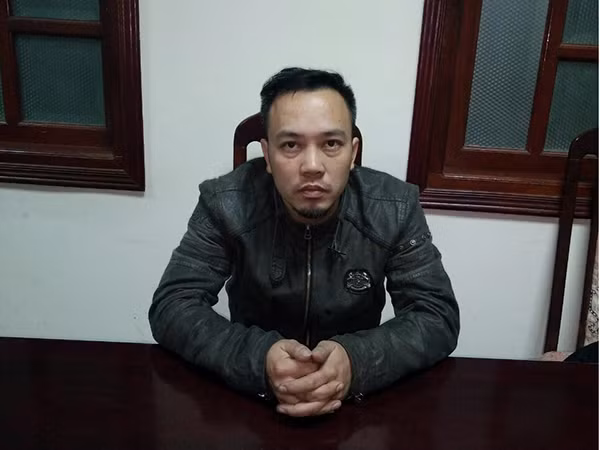 Đối tượng Nguyễn Đức Minh tại cơ quan công an. Ảnh CAND