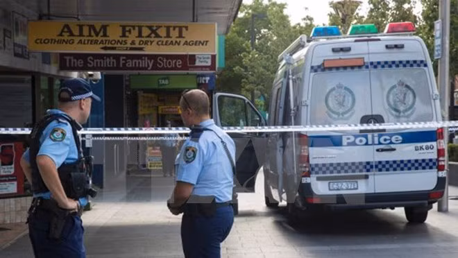 Cảnh sát điều tra tại hiện trường vụ nổ súng. (Nguồn: The Sydney Morning Herald/TTXVN)