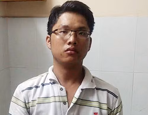 Minh tại cơ quan điều tra. Ảnh: Quốc Thắng.