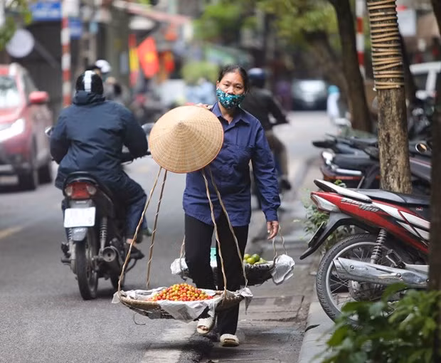 Người lao động tự do bị ảnh hưởng bởi dịch COVID-19 sẽ được nhận hỗ trợ từ Nhà nước. (Ảnh: TTXVN)