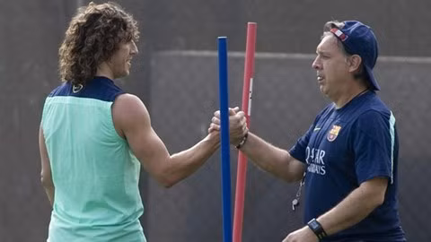 Puyol và HLV Martino