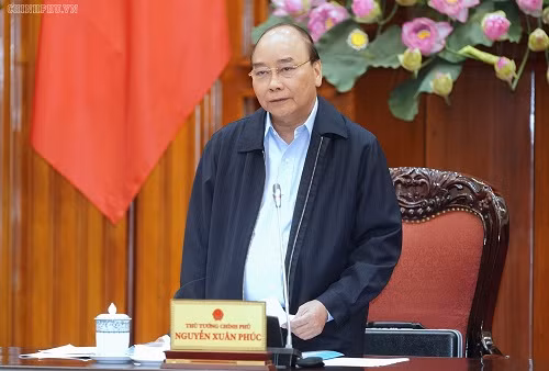 Thủ tướng Nguyễn Xuân Phúc phát biểu tại cuộc họp - Ảnh: VGP/Quang Hiếu