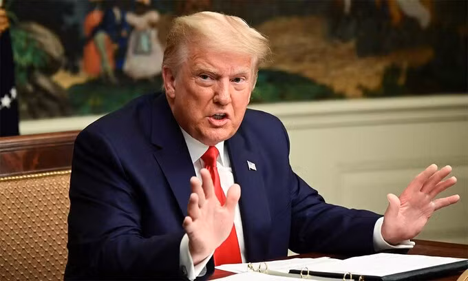 Tổng thống Mỹ Donald Trump trong cuộc họp báo tại Nhà Trắng, ngày 26/11. Ảnh: AFP.