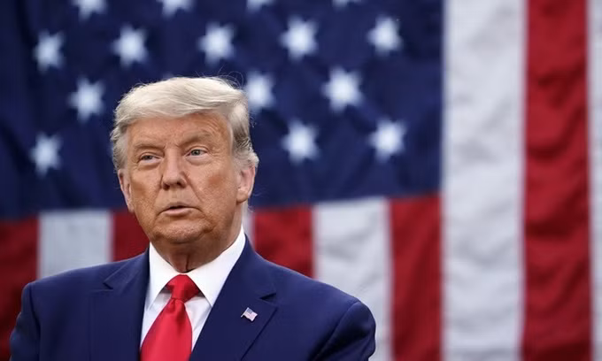 Tổng thống Mỹ Donald Trump với mái tóc xám trắng tại cuộc họp báo ở Nhà Trắng hôm 13/11. Ảnh: AFP.